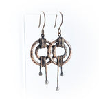 Hammered copper double ring earrings on white background — coiled wire wrap, ball drop stems, RVSTICA
