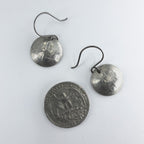 Vintage Currency dime earrings with quarter for size reference — white background
