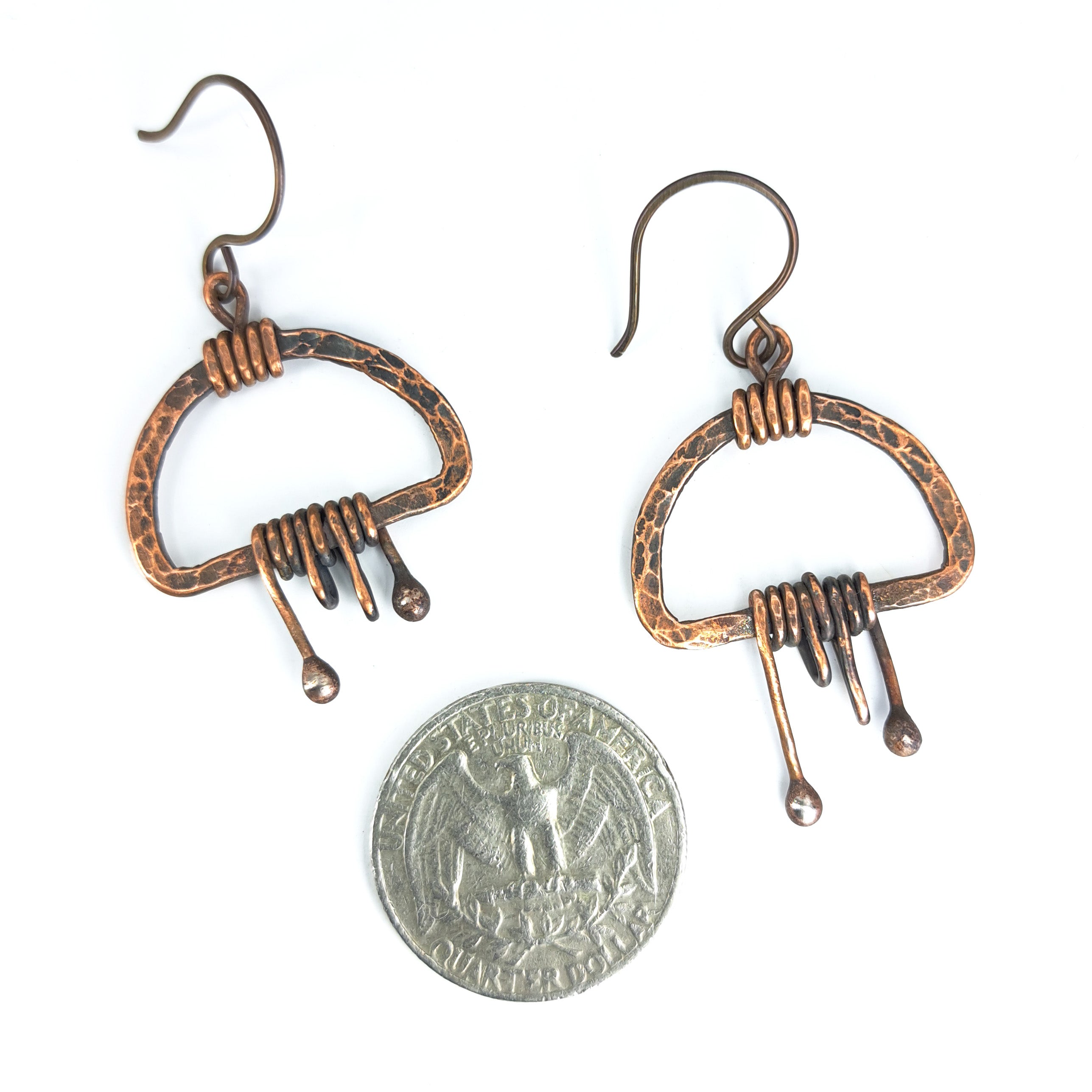 Earrings with quarter for size reference, approximately 1 inch wide — Nimbus Storm