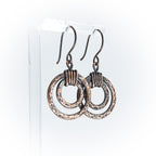 Eclipse Rings: Textured Concentric Copper Circle Dangles